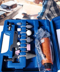 Hardcore Aluminum Air Die Grinder 16 Piece Pneumatic Power Tool Kit With 3mm And 6mm Quick Swap Collets in a blue case with tools.