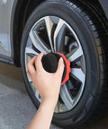 Applying tire shine with Two Pack Large Tire Shine Applicator Pads With Hex Grip For Even Coats Of Tire Shine on car wheel