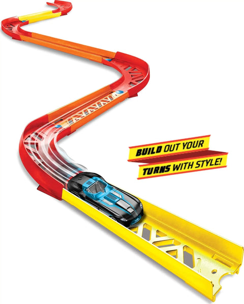 Track Builder Unlimited Playset Premium Curve Pack With 16 Component Parts And 1 64 Scale Vehicle on a winding track.