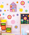 Classroom wall with colorful floral decorations using 482 Piece DIY Flower Cutouts Set With Colorful 2 Sided Cardstock Die Cuts.