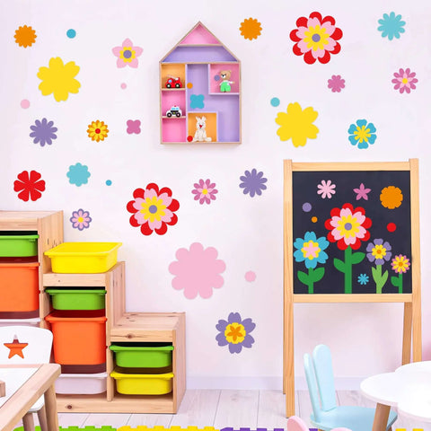 Classroom wall with colorful floral decorations using 482 Piece DIY Flower Cutouts Set With Colorful 2 Sided Cardstock Die Cuts.