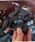 Black metal flywheel holding tool for automotive engines; toothed end and locking bracket.