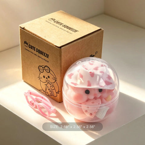 Totally Sweet Handmade Squishy Hamster Toy For Chill Out Vibes, ultra soft silicone fidget in clear container with pink glasses.