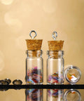 Totally Sweet Mini Glass Bottles With Cork Stoppers And Eye Screws Hella Practical Funnel Kit For Diy Crafts Perfume Sampling Raffle Prizes And Creative Hobby Builds 50 Piece 0.5Ml Pack, filled with colorful shapes.
