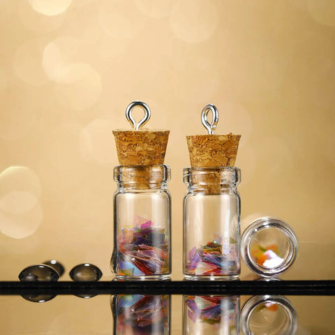 Totally Sweet Mini Glass Bottles With Cork Stoppers And Eye Screws Hella Practical Funnel Kit For Diy Crafts Perfume Sampling Raffle Prizes And Creative Hobby Builds 50 Piece 0.5Ml Pack, filled with colorful shapes.