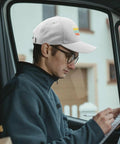 My Favorite Granddaughter Gave Me This Cool White Men Adjustable Cap Hat With Washed Cotton Look worn by man in car