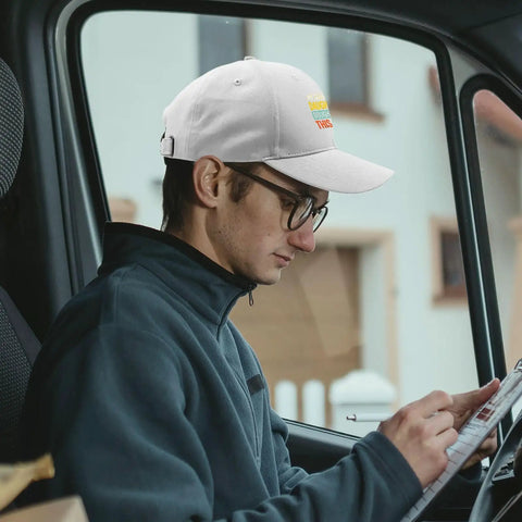 My Favorite Granddaughter Gave Me This Cool White Men Adjustable Cap Hat With Washed Cotton Look worn by man in car