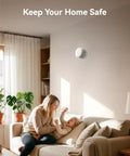 10 Pack Photoelectric Smoke Detectors Hardwired And Interconnected With 9V Battery Backup mounted on wall above mother and child.