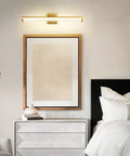 Brushed Gold 24 Inch Vanity Light With 3000K LED above bedside, modern water ripple shade, rust-resistant aluminum brass finish