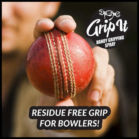 Hand applying chalkless grip spray to a red cricket ball, enhancing grip for pole dancing aerial silk and court sports like tennis and pickleball.