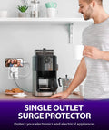 Man in a kitchen using a white grounded outlet with on off switch two pack 3 prong surge protector 245J single port power adapter.