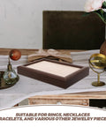 Crafted From Warm Wood This Super Chic 30 Compartment Jewelry Organizer Stores Rings Necklaces And Bracelets Straight Up In Style While You Kick Clutter To The Curb And Look Awesome Daily on a table.