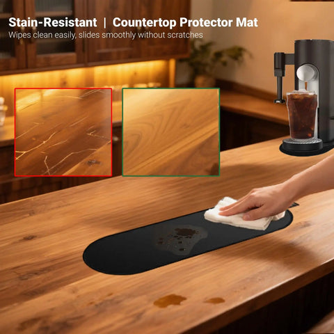 Person cleaning Sliding Pad For Single Serve Coffee Makers PB051 PB041 Smooth Glide Espresso Mat Countertop Protector on wood surface.