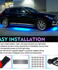 Installed Double Row RGB LED Underglow Light Kit With Bluetooth App Control and Wireless Remote on a black SUV, showing blue lights.