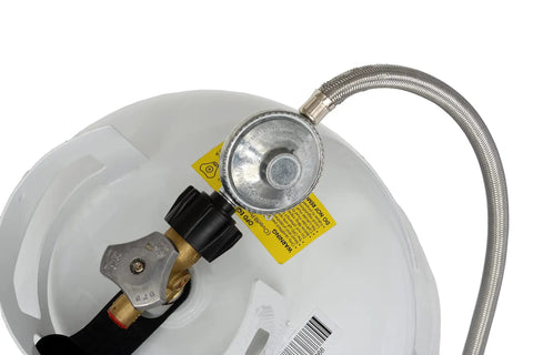 Five-Foot Universal QCC1 Low-Pressure Propane Regulator With Stainless Steel Braided Hose attached to propane tank top view