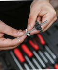 Person holding 4 Piece T Slot Bolts and Star Handle Knobs with Flat Washers for Woodworking Jig Hardware.