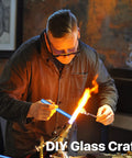Person using Blue Borosilicate Glass Tubes Set Of 20 For Art DIY Projects in glass blowing studio