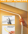 COB LED Strip Lights Pro 16.4Ft Warm White DimmableSelf Adhesive Rope Light being installed under cabinet