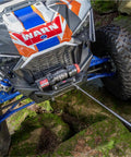 ATV using Hub Wireless Receiver for Powersports Winches with Bluetooth Smartphone Control in rocky terrain