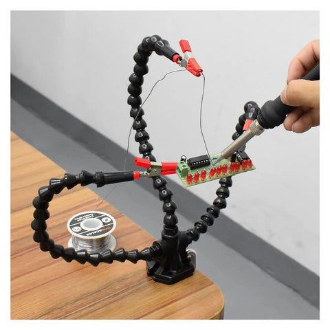 Helping Hands Soldering Tool With Flexible Gooseneck Arms 360 Degree Alligator Clips holding PCB during soldering on table clamp