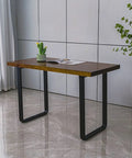 Badass 2 Pack Heavy Duty Steel Table Legs Industrial Modern Style For Dining Tables And Home Office Desks Rust Proof Finish supporting a wooden desk.