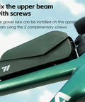 Bolt-On Top Tube Bike Bag With Magnetic Flap For Quick Access During Rides on bike frame, green color with screw attachment.