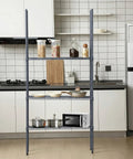 4 Pack 74 Inch Wire Shelving Post Set With Eight Heavy Duty Chrome Pole Sections And Fifty Shelf Clips in a kitchen setting