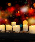 Rechargeable Flameless Tea Lights With Timer And Remote 12 Pack Flickering LED Votive Candles With Two USB Charging Cables Warm White Glow For Home Halloween And Xmas Decor Easy Peasy To Use And Low Maintenance glowing in dark setting with colorful bokeh background.