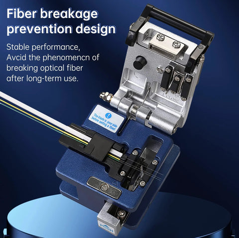 Fiber optic termination tool on a blue base with metal clamps and fiber cable.