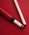 Graphite Cane With Rolling Marshmallow Tip, Lightweight Yet Stronger Than Aluminum, Foldable Shaft, red handle on red background
