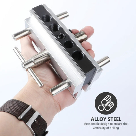 Top Shelf Self Centering Doweling Jig And Sharp Wood Drill Guide with rugged steel bushings held in hand for easy use.