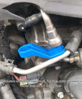 Blue tool disconnecting fuel line in engine, part of 16 Piece Fuel Line And Transmission Quick Disconnect Tool Set For Cars.