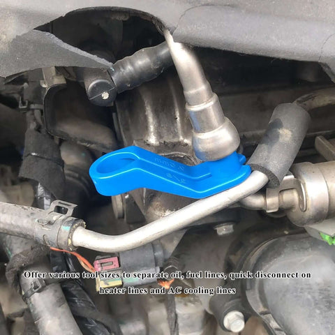 Blue tool disconnecting fuel line in engine, part of 16 Piece Fuel Line And Transmission Quick Disconnect Tool Set For Cars.