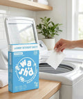 Heavy Duty Laundry Detergent Sheets Featuring 3x Stain Fighting Enzymes being added to a washing machine for easy cleaning.