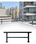 Dead Set Strong Horizontal Deck Railing Kit Adjustable Flat Fence Extension No Sweat Install Rust Resistant Stainless Steel Outdoor Patio Safety Guardrail with view of urban landscape.