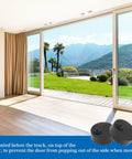 4 Pack Anti Jump Disk Block Sliding Barn Door Hardware Set With Adjustable Stopper Pads, shown in a modern living room setting.