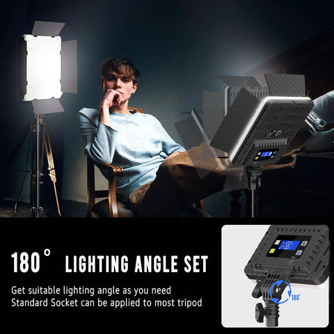 Man sitting next to 2-Pack Pro-Grade Bi-Color LED Photography Lighting Kit, 36W Output, 2700K-6500K, CRI 95 Plus, on tripod stand