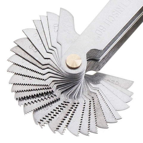 Front view: thread pitch gauge set of metal blades fanned around a brass pivot for metric and imperial threads