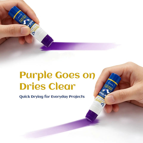 Applying All Purpose Office Glue Sticks 6g Pack Of 30 Purple Goes On Dries Clear showing purple line on white paper