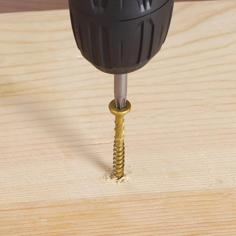 Workhorse Number 10 By 4 Inch Golden Deck Screws With T25 Torx Star Drive and Bugle Head being installed into wood.