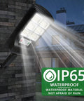 Outdoor Solar Lights 4 Pack 1000 Lumens Motion Sensor Security Flood Lights Waterproof IP65 mounted on exterior wall in rain