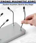 Magnetic Helping Hands Soldering Station with 12 clips and steel box in use, silver finish, showing setup for soldering and painting.
