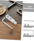 Heavy Duty 2Pc Stainless Steel Broken Valve Screw Extractor Kit Perfect For Pulling Stripped Threads And Removing Messy Plumbing Fixtures Fast Without Stress. pipe threading tool set with hex key and metal die on table