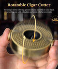 Hand holding V Shape Cigar Cutter 3 In 1 With Stainless Steel Blade Integrated Holder And Decompression Rotator