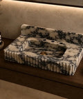 Premium Calacatta Viola Marble Fluted Vanity Sink Featuring Bold Stone Details And Dope Countertop Setup For Indoor Bathrooms Or Residential Vanities Built Tough For Daily Use, displayed on a wooden countertop.