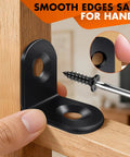Close-up of a black L bracket with screw being installed, part of the All In One Value Kit With 40 Black L Brackets And 80 Screws Stainless Steel 90 Degree Right Angle Corner Braces For Shelves Cabinets And Furniture Easy DIY Install No Trips To The Hardware Store.