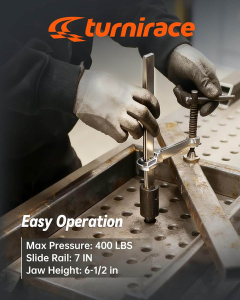 Two Pack Welding Table Clamps With Six Point Five Inch Opening Capacity For Five Eighth Inch Holes in use on metal table