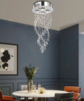 Modern Spiral Raindrop Crystal Chandelier Three Light Flush Mount Ceiling Fixture With K9 Crystal Orbs in a dining room setting