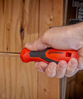 Quarter Inch Drive Dual Material Bit Holding Screwdriver Handle With Ergonomic Balance Grippy Oil And Solvent Resistant Grip Full Polish Chrome Shank Pro Grade Quality Meets ANSI ASME Specs used to tighten a screw on a wooden surface.