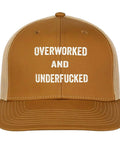 Front view of a brown low profile trucker cap for women with bold white text on the front panel.